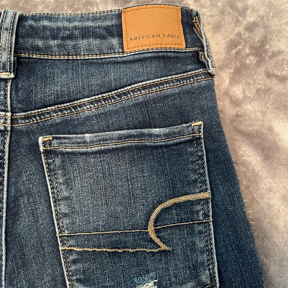 Dark wash American eagle jeans size 2 regular next level stretch ripped